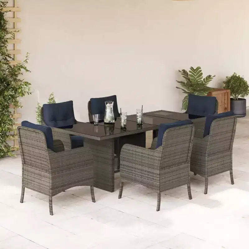 vidaXL Salon de jardin 7 pièces en résine tressée grise avec coussins bleus et table en verre trempé