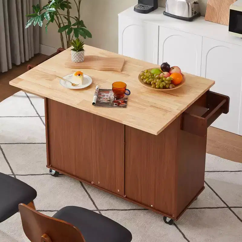 FAMYYT Îlot de Cuisine Marron à Dessus en Bois Rabattable de 54 po avec 3 Tiroirs, Roulettes Verrouillables et Étagères de Rangement