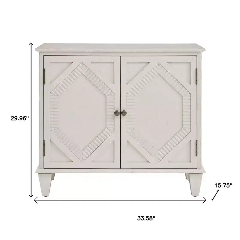 HomeRoots 34 White Wood Carved Geometric Accent Cabinet With Two Doors