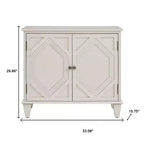 HomeRoots 34 White Wood Carved Geometric Accent Cabinet With Two Doors
