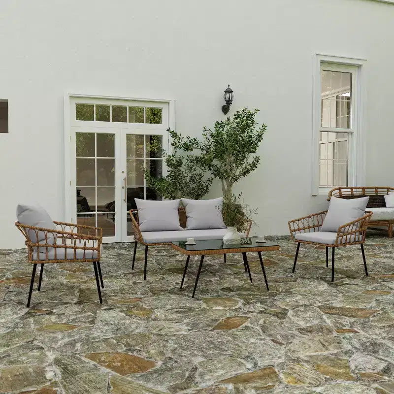 Merrick Lane Four Piece Indoor/Outdoor Boho Open Weave Natural Rattan Rope Patio Set with Two Chairs, Loveseat and Table with Cushions