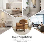 Fauteuil Gianluigi en similicuir végane de transition avec clous décoratifs et pieds en bois massif pour la chambre et le salon | ART OF LIVING DESIGNS