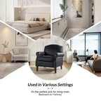Fauteuil Gianluigi en similicuir végane de transition avec clous décoratifs et pieds en bois massif pour la chambre et le salon | ART OF LIVING DESIGNS
