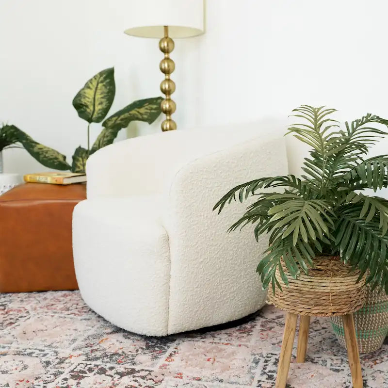 Fauteuil pivotant Belinda en tissu bouclé, style milieu de siècle moderne