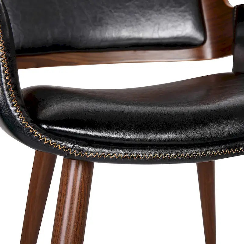 Chaise de salle à manger en similicuir de style milieu de siècle Carson Carrington Kjerringvag avec pieds en métal