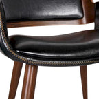 Chaise de salle à manger en similicuir de style milieu de siècle Carson Carrington Kjerringvag avec pieds en métal