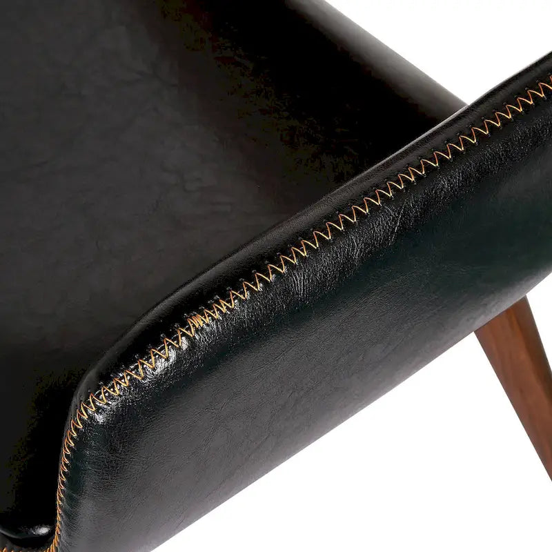 Chaise de salle à manger en similicuir de style milieu de siècle Carson Carrington Kjerringvag avec pieds en métal