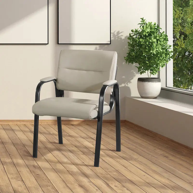 Guest Chair in Faux Leather and Black Finish Frame