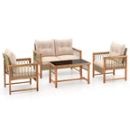 Ensemble de mobilier de patio Costway 4 pièces avec cadre en bois d'acacia, coussins et table basse
