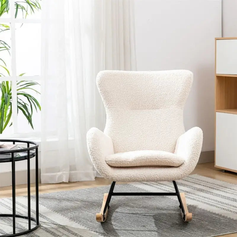 Fauteuil à bascule en tissu rembourré avec dossier haut et accoudoirs