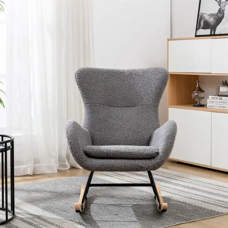 Fauteuil à bascule en tissu rembourré avec dossier haut et accoudoirs