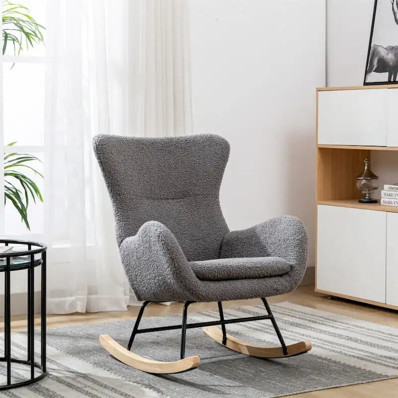 Fauteuil à bascule en tissu rembourré avec dossier haut et accoudoirs