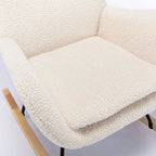 Fauteuil à bascule en tissu rembourré avec dossier haut et accoudoirs
