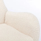 Fauteuil à bascule en tissu rembourré avec dossier haut et accoudoirs