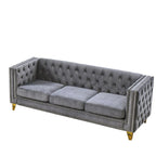 Canapé moderne en velours avec capitonnage et pieds en métal