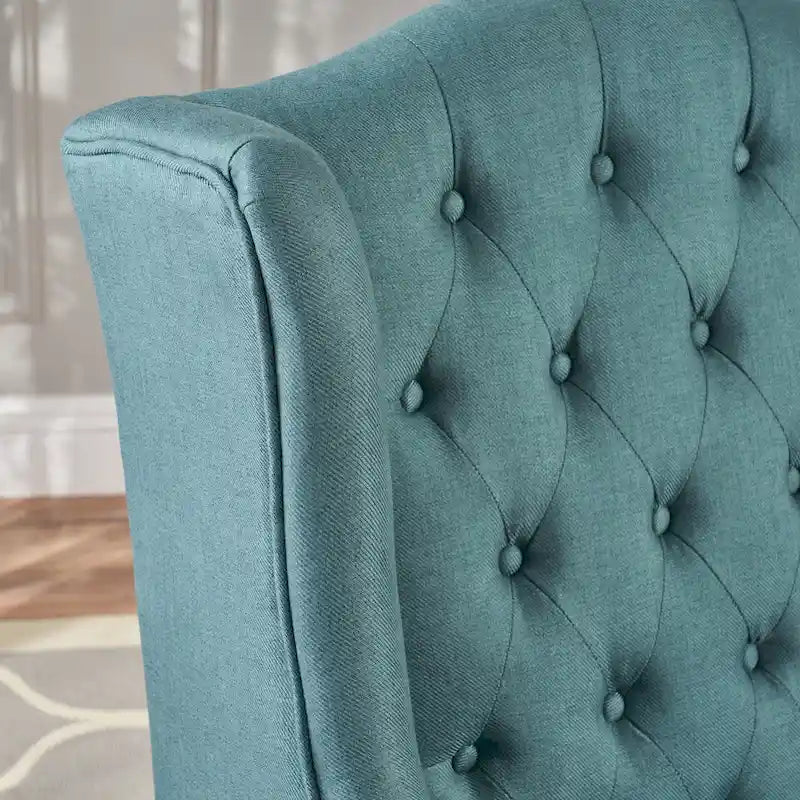 Fauteuil à oreilles tapissé