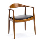 Fauteuil avec accoudoirs coudés